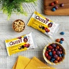 image:imageQuest Nutrition Coated Candies Peanut Butter 1g Sugar 10g Protein 4g Net Carbs Gluten Free Keto Friendly 12 CountChocolatey Peanut
